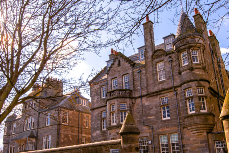 Sunny photo of Kennedy Hall from The Scores